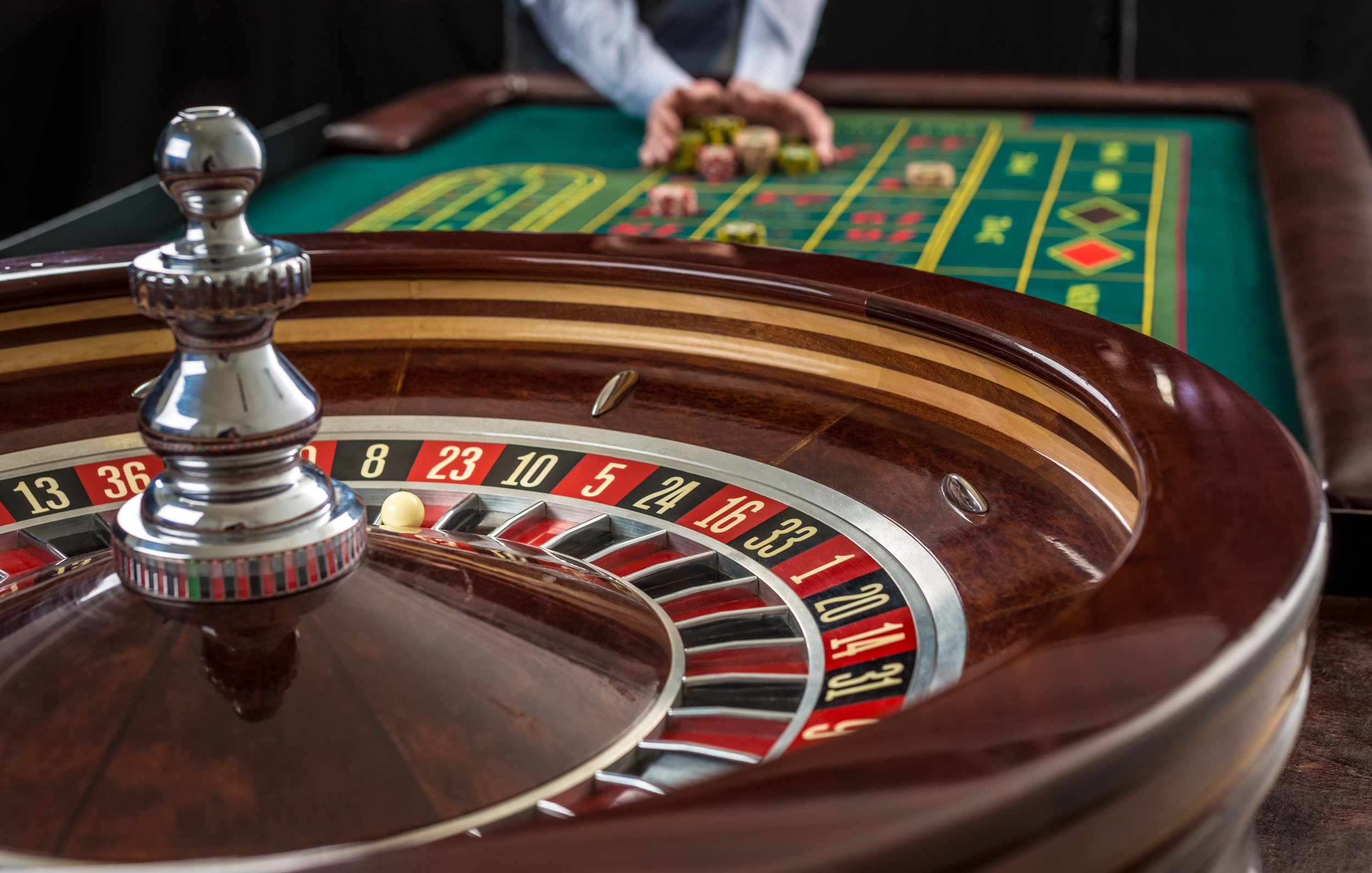 High roller player placing bets on exclusive casino games